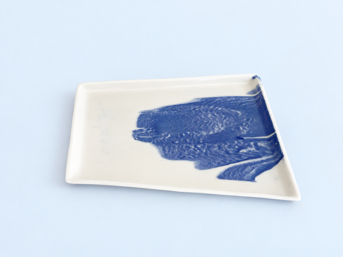 Trio servingware — original blue and white porcelain, soft solid background 3