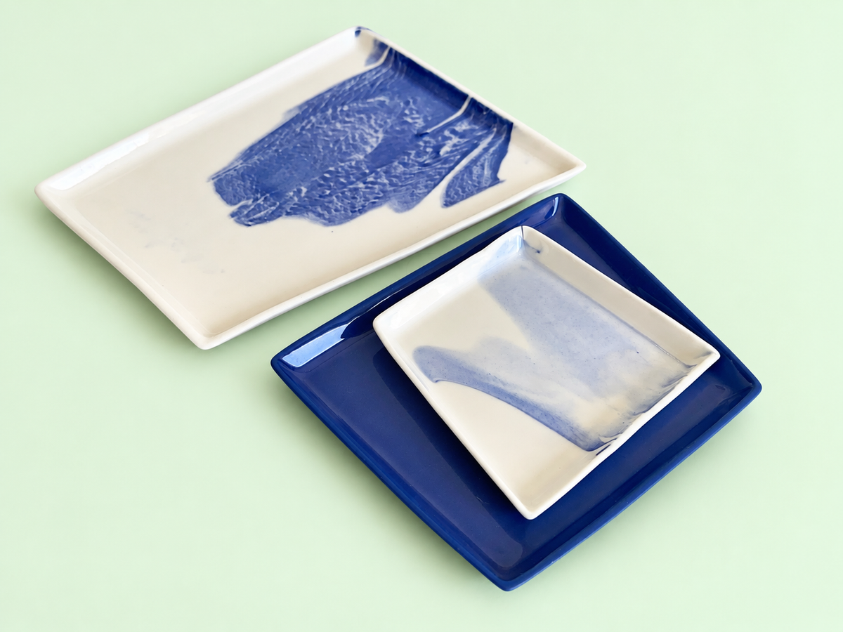 Trio servingware — original blue and white porcelain, soft solid background 2